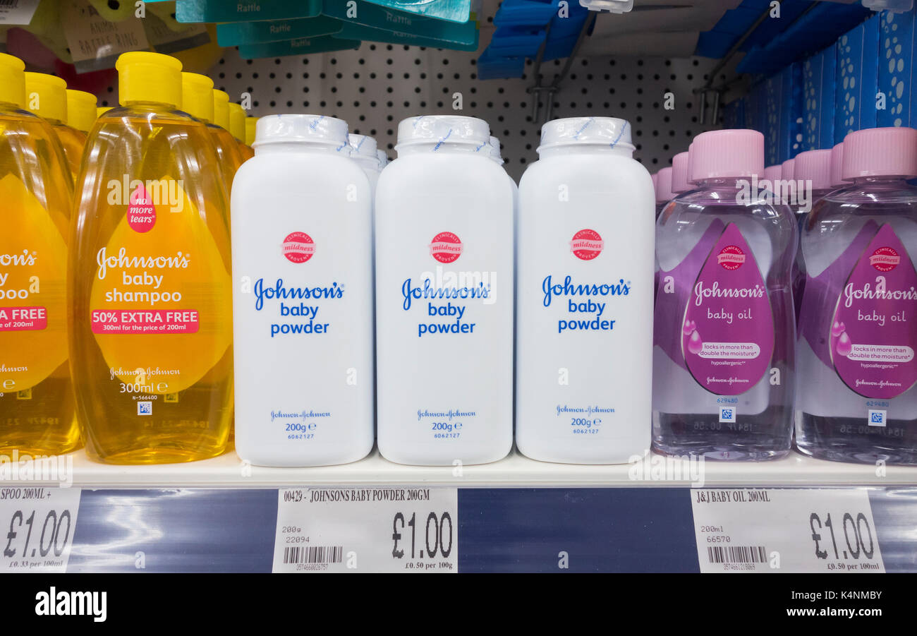 Johnson`s baby products: shampoo, oil and powder on supermarket shelf. UK Stock Photo